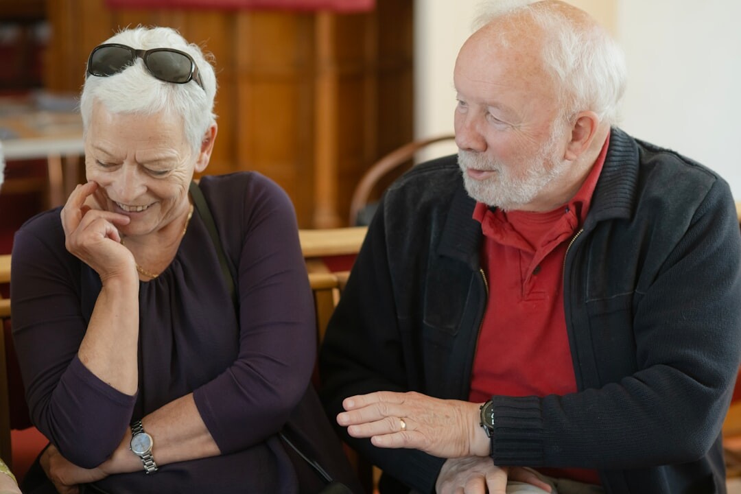 seniors laughing at table